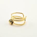 Bague Paola dorée en acier inoxydable avec triple anneau élégant