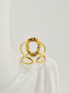 Bague Alizé en acier inoxydable doré, design moderne et texturé, ajustable et élégante.