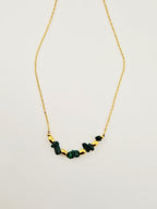 Voici la **balise alt optimisée SEO** pour ton image 👇

**Alt :**

Collier agatha doré en acier inoxydable avec perles naturelles vertes et dorées, bijou élégant et raffiné`
